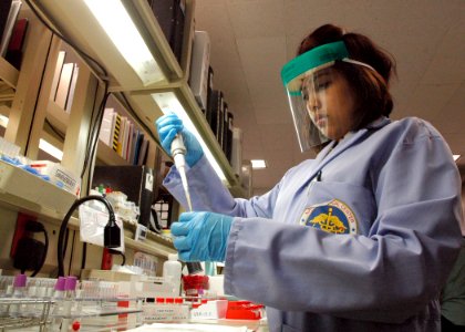 US Navy 090302-N-6326B-030 Hospital Corpsman 3rd Class Ivy Gaskins uses a pipette to mix a red blood count suspension to confirm the donor' blood type in the Naval Medical Center San Diego Blood Bank