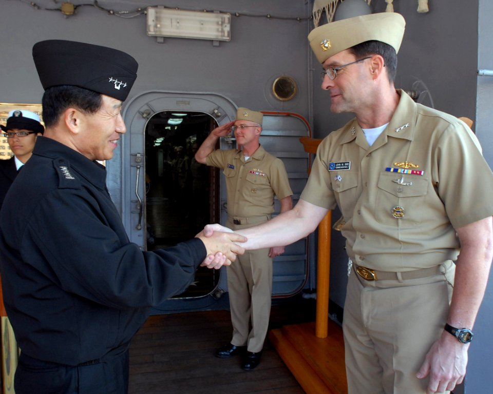 US Navy 090308-N-1113S-001 Republic of Korea Navy Chief of Naval Operations Adm. Jung Ok-Keun shakes hands with Vice Adm. John M. Bird, commander of the U.S. 7th Fleet