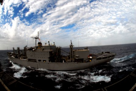 US Navy 090306-N-9928E-011 The Military Sealift Command combat stores ship USNS San Jose (T-AFS 7) steams alongside the Nimitz-class aircraft carrier USS John C. Stennis (CVN 74) during a replenishment-at-sea