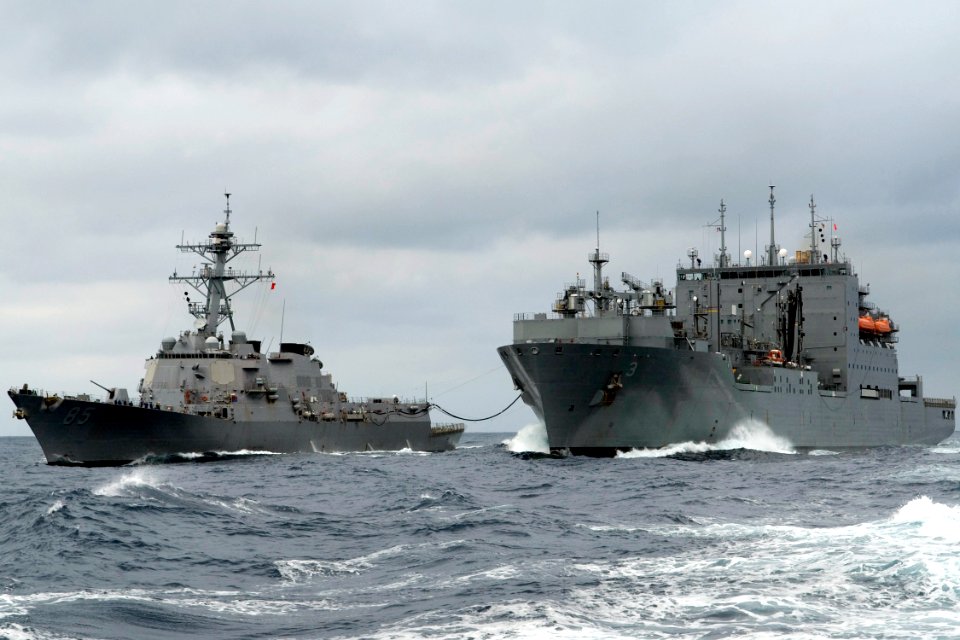 US Navy 090304-N-9123L-004 The guided-missile destroyer USS McCampbell (DDG 85) conducts an underway replenishment with the Military Sealift Command dry cargo-ammunition ship USNS Alan Shepard (T-AKE 3)
