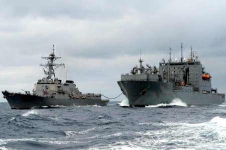 US Navy 090304-N-9123L-004 The guided-missile destroyer USS McCampbell (DDG 85) conducts an underway replenishment with the Military Sealift Command dry cargo-ammunition ship USNS Alan Shepard (T-AKE 3)
