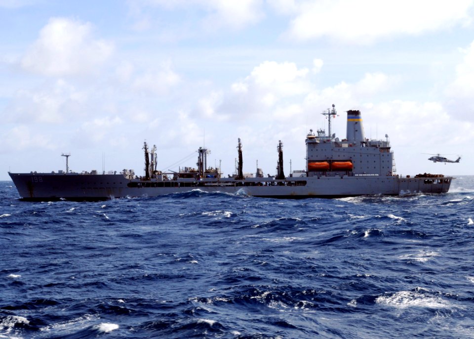 US Navy 090303-N-4014G-121 The Military Sealift Command fleet replenishment oiler USNS Big Horn (T-AO 198) conducts a vertical replenishment with the aircraft carrier USS Dwight D. Eisenhower (CVN 69)