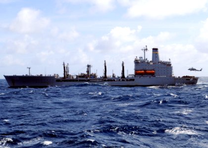US Navy 090303-N-4014G-121 The Military Sealift Command fleet replenishment oiler USNS Big Horn (T-AO 198) conducts a vertical replenishment with the aircraft carrier USS Dwight D. Eisenhower (CVN 69)