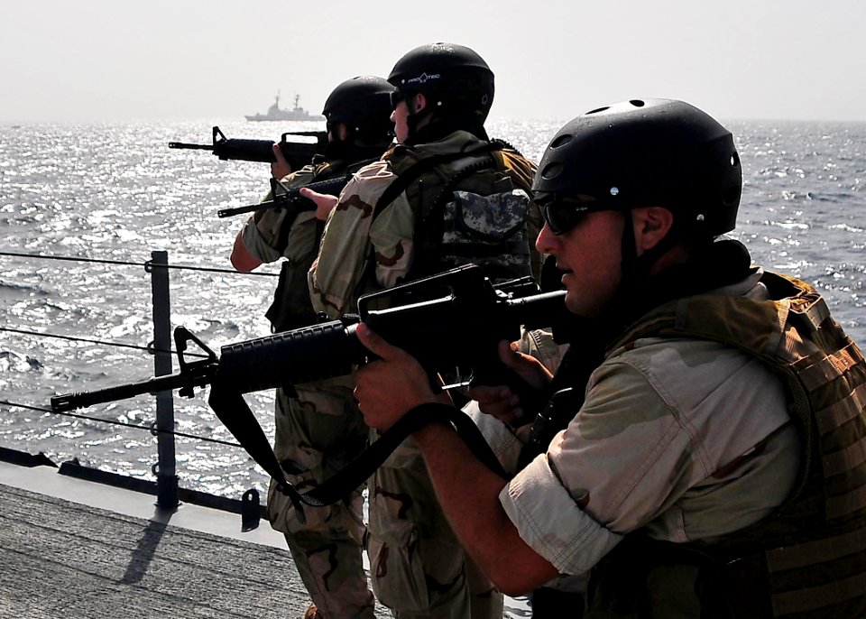 US Navy 090304-N-4774B-017 Members of a visit, board, search, and seizure team from the U.S. Coast Guard high endurance cutter Boutwell (WHEC 719) conduct drills aboard the guided-missile cruiser USS Lake Champlain (CG 57)