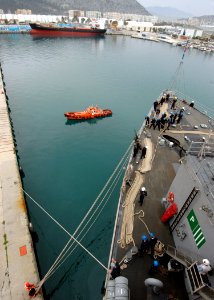 US Navy 090305-N-9134V-184 The amphibious dock landing ship USS Carter Hall (LSD 50) prepares to leave Antalya, Turkey photo