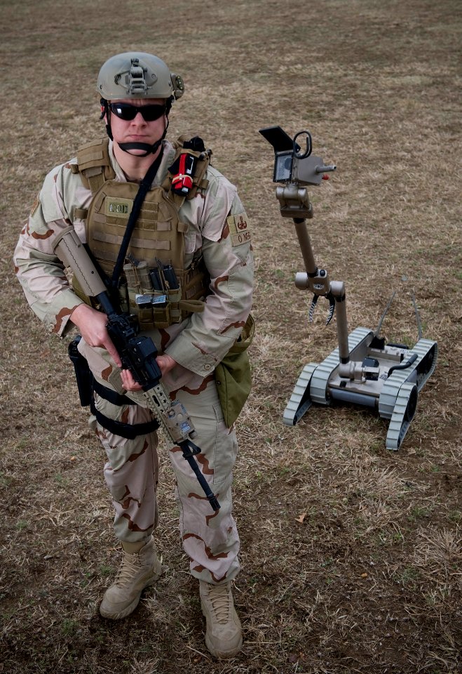 US Navy 090310-N-7090S-001 Explosive ordnance disposal technicians are using remote-controlled machines to help detect and defuse improvised explosive devices
