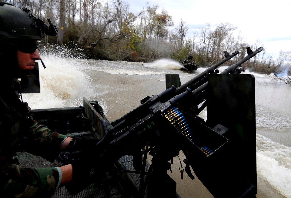 US Navy 090304-N-8933S-165 Special Warfare Combatant-craft Crewmen conduct live-fire drills