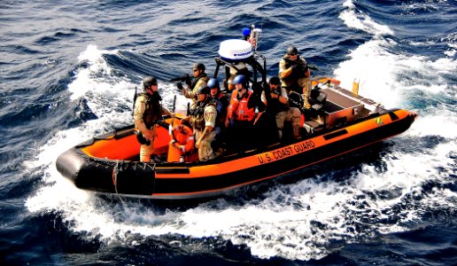 US Navy 090304-N-4774B-008 Members of a visit, board, search, and seizure team from the U.S. Coast Guard high endurance cutter Boutwell (WHEC 719) prepare to board the guided-missile cruiser USS Lake Champlain (CG 57)