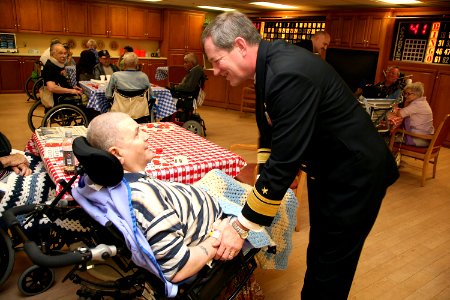 US Navy 090305-N-3271W-069 Rear Adm. Leendert R. Hering Sr., commander of Navy Region Southwest, greets residents of the Veterans Administration Nursing Home during his visit to Phoenix for Navy Week