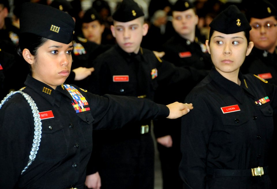 US Navy 090314-N-8848T-791 Taft High School's Navy Junior Reserve Officers Corps (NJROTC) Cadet, Lt. Cmdr. Tracey Soto performs a dress right facing movement