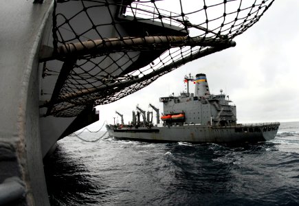 US Navy 090304-N-9928E-002 The Military Sealift Command fleet replenishment oiler USNS Pecos (T-AO 197) steams alongside the Nimitz-class aircraft carrier USS John C. Stennis (CVN 74)