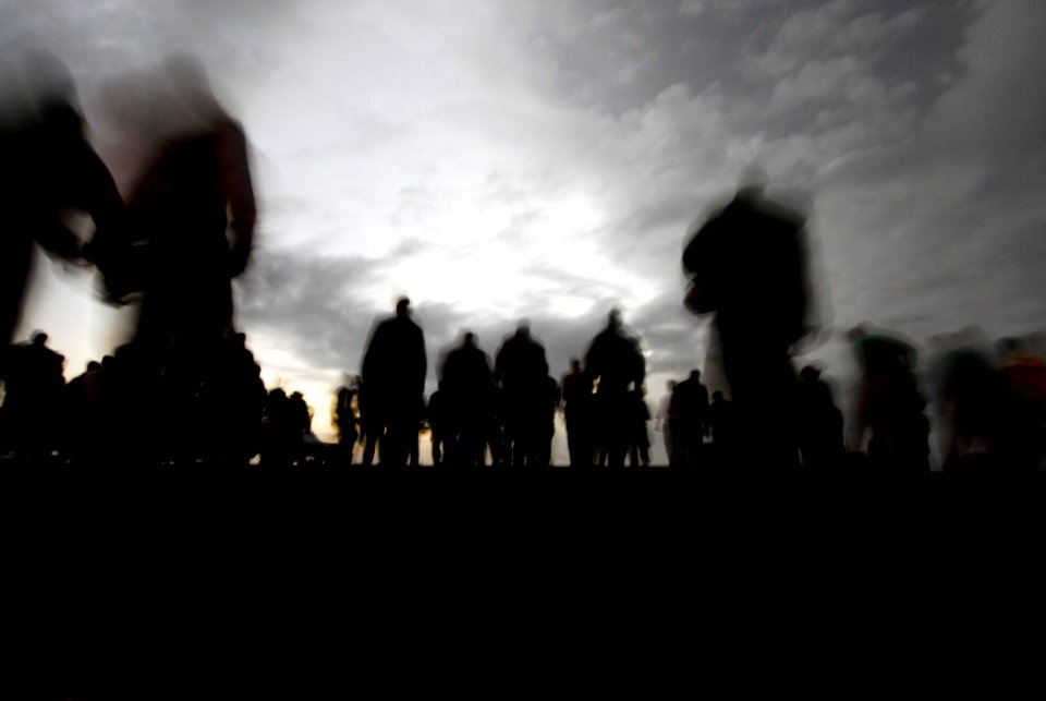 US Navy 090306-N-6046S-096 Sailors and Marines conduct a foreign object debris walk-down at dusk on the flight deck of the aircraft carrier USS John C. Stennis (CVN 74)