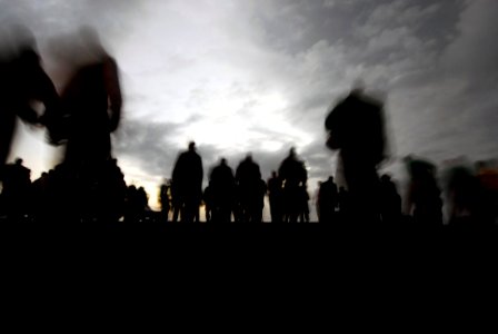 US Navy 090306-N-6046S-096 Sailors and Marines conduct a foreign object debris walk-down at dusk on the flight deck of the aircraft carrier USS John C. Stennis (CVN 74)