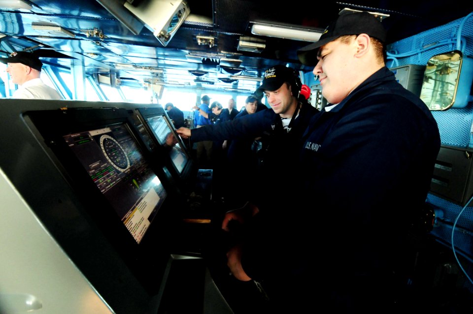 US Navy 090305-N-9760Z-002 Seaman Erik Pardo stands watch as Helmsman in the Pilot House aboard the nuclear-powered aircraft carrier USS Nimitz (CVN 68)