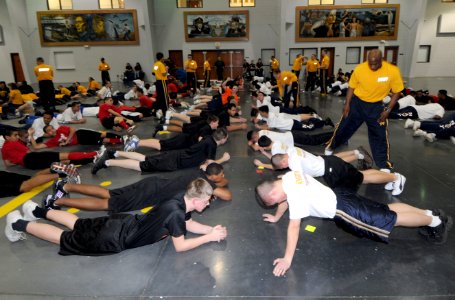 US Navy 090314-N-8848T-596 Navy Junior Reserve Officers Training Corps (NJROTC) Cadets perform pushups in the Pacific Fleet Drill Hall at Recruit Training Command