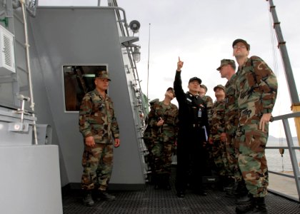 US Navy 090318-N-9573A-007 Navy reservists assigned to Commander, U.S. Naval Forces Korea are given a tour by sailors from the Republic of Korea multipurpose destroyer ROKS Wang Geon (DDH 978)