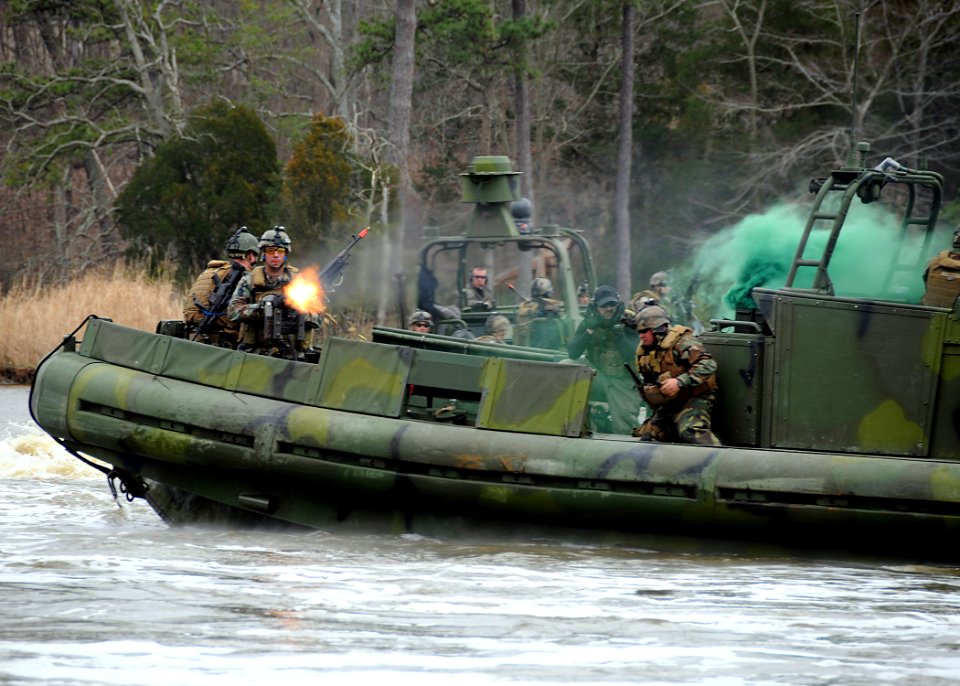 US Navy 090319-N-4267W-284 Sailors assigned to Riverine Squadron (RIVRON) 3 react to a simulated attack during a patrol exercise. RIVRON 3 is conducting unit level training in preparation for their upcoming deployment