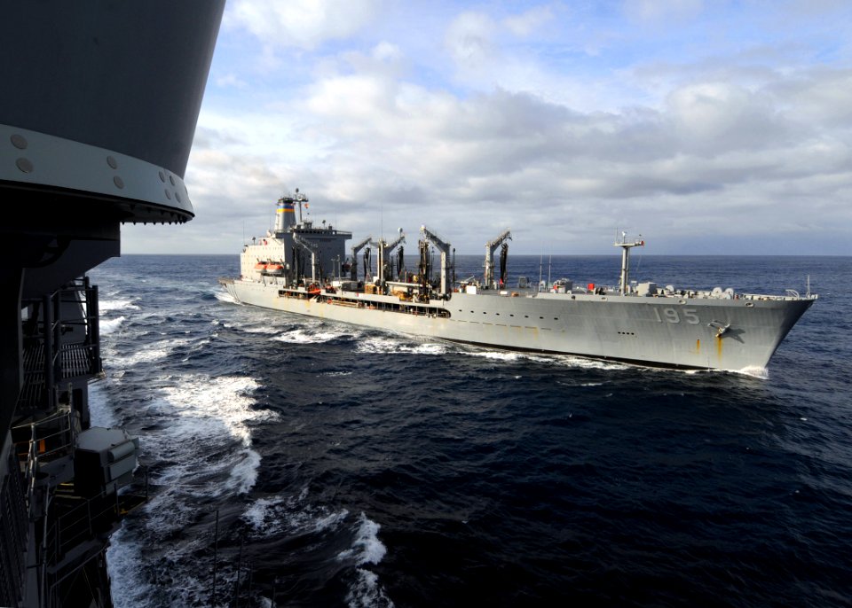US Navy 090317-N-1082Z-010 The Military Sealift Command fleet replenishment oiler USNS Leroy Grumman (T-AO 195) comes alongside the guided-missile cruiser USS Vella Gulf (CG 72) to conduct a replenishment at sea