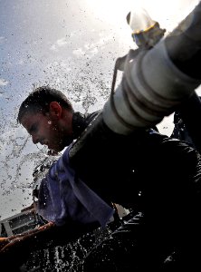 US Navy 090319-N-4774B-028 Chief Gunner's Mate Brian Binder patches a ruptured pipe during a timed training exercise aboard guided-missile cruiser USS Lake Champlain (CG 57)