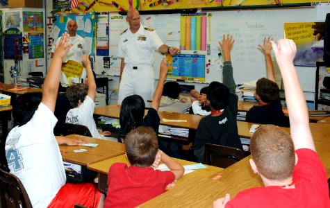 US Navy 090320-N-3666S-147 Capt. Ricks Polk, commanding officer of Afloat Training Group Middle Pacific answers questions from students during a Career Day at Iroquois Point Elementary School