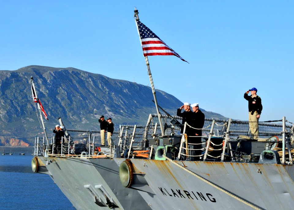 US Navy 090317-N-0780F-007 Sailors aboard the guided-missile frigates USS Klakring (FFG 42) and USS Robert G. Bradley (FFG 49) conduct morning colors during a routine port visit to Souda Bay