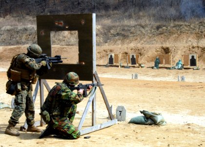 US Navy 090317-N-9573A-004 Marines and the Republic of Korea (ROK) Marine Infantry Company are collaborating in a combined combat marksmanship shoot photo