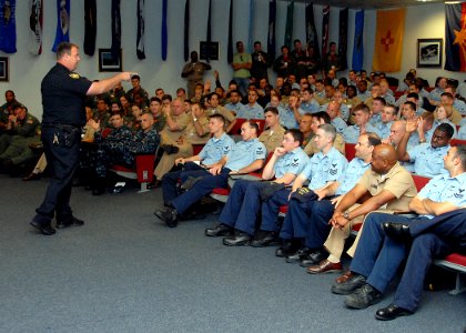 US Navy 090317-N-3013W-015 Deputy Wade Chapman of the Jacksonville Sheriff's Office takes questions from the Sailors photo