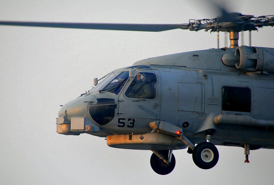 US Navy 090319-N-4774B-033 Lt. Cmdr. Michael Powell pilots an SH-60B Seahawk helicopter assigned to the