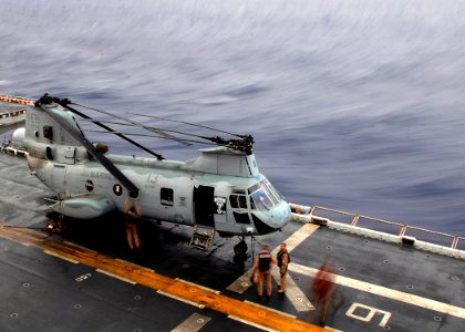 US Navy 090321-N-5681S-051 Marines assigned to Marine Medium Helicopter Squadron (HMM) 264 perform maintenance on a CH-46 Sea Knight aboard the multi-purpose amphibious assault ship USS Iwo Jima (LHD 7)