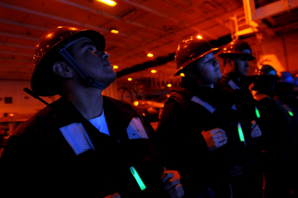 US Navy 090320-N-3610L-758 Boatswain's Mate Seaman Manuel Garcia stands in formation in the hangar bay of the aircraft carrier USS Ronald Reagan (CVN 76) during a replenishment at sea