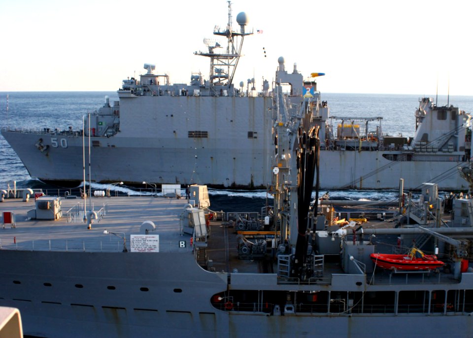 US Navy 090323-N-6764G-064 The amphibious dock landing ship USS Carter Hall (LSD 50) pulls alongside the Military Sealift Command fleet replenishment oiler USNS Kanawha (T-AO 196)
