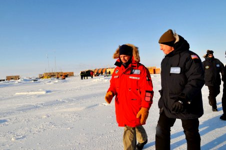 US Navy 090322-N-8273J-194 Chief of Naval Operations (CNO) Adm. Gary Roughead speaks with Capt. Greg Ott, officer in tactical command of the Applied Physics Lab Ice Station while touring the camp in the Arctic Ocean during Ice photo
