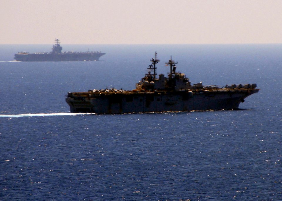 US Navy 090322-N-8283S-041 The Amphibious assault ship USS Boxer (LHD 4) and the aircraft carrier USS Theodore Roosevelt (CVN 71) transit the Gulf of Aden