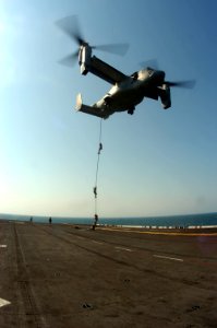 US Navy 090323-N-8154G-352 Marines assigned to the 22nd Marine Expeditionary Unit (MEU) conduct a fast-rope exercise from an MV-22B Osprey onto the amphibious assault ship USS Bataan (LHD 5)