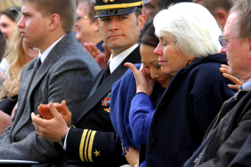 US Navy 090326-N-5366K-199 Donna Axelson, mother of fallen Navy SEAL Sonar Technician (Surface) 2nd Class (SEAL) Matthew Axelson, comforts her daughter-in-law, Maria