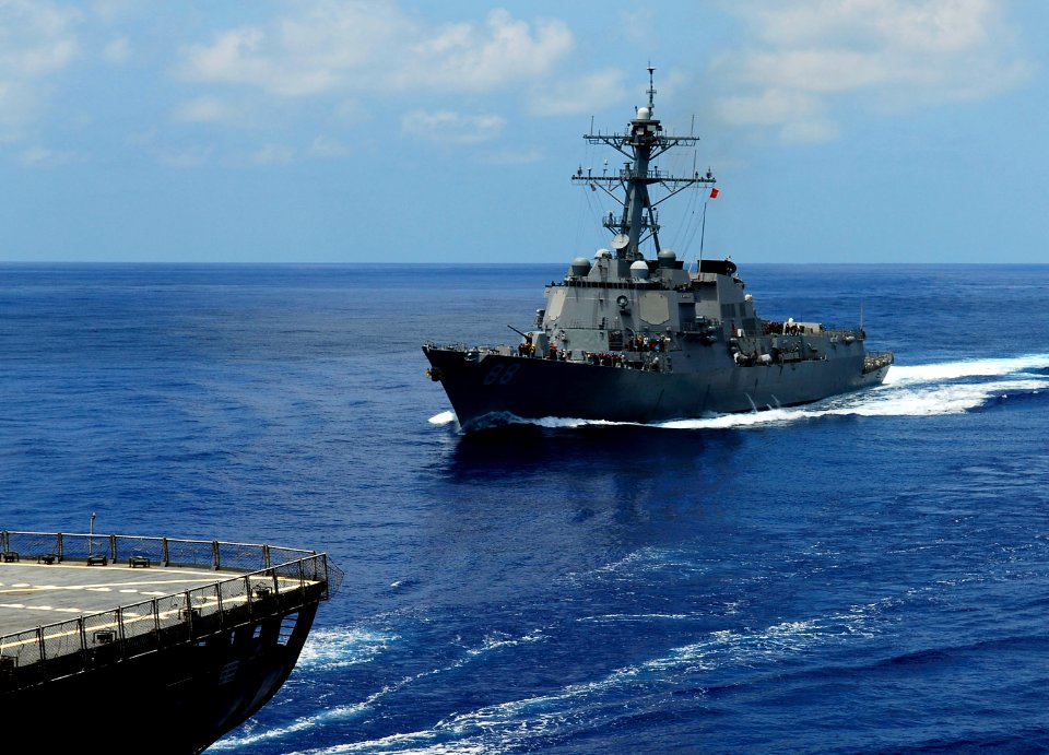 US Navy 090324-N-9928E-040 The Arleigh Burke-class guided-missile destroyer USS Preble (DDG 88) approaches the Military Sealift Command fleet replenishment oiler USNS John Ericsson (T-AO 194)
