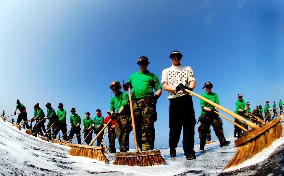 US Navy 090323-N-9928E-107 Flight deck personnel scrub-down the flight deck of the aircraft carrier USS John C. Stennis (CVN 74)