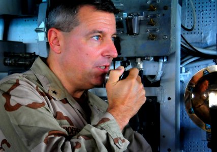 US Navy 090326-N-4774B-146 Rear Adm. Thomas A. Cropper, deputy commander of U.S. Naval Forces Central Command, speaks to Sailors on the 1MC