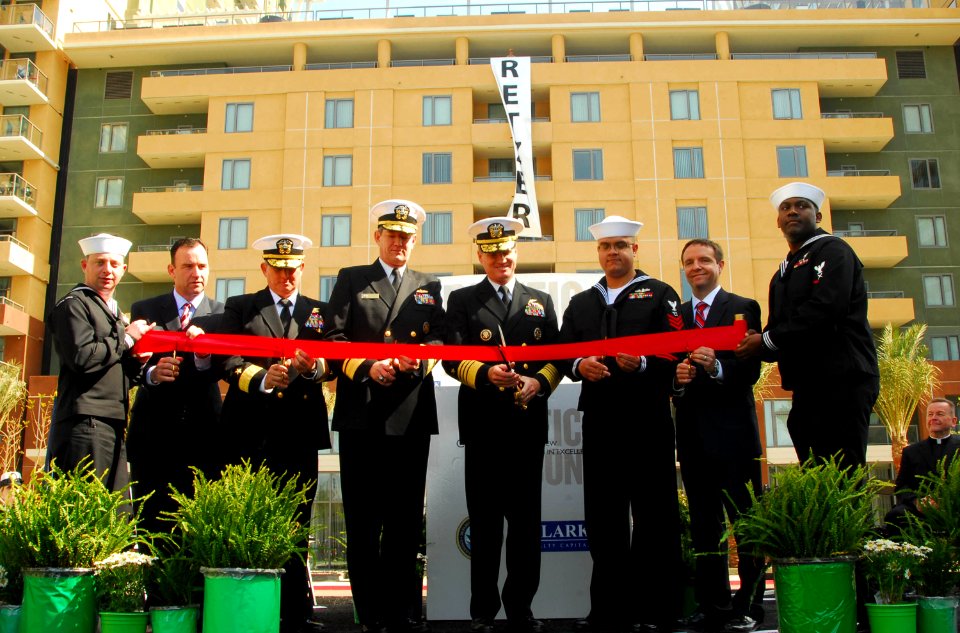 US Navy 090326-N-5617R-169 Vice Chief of Naval Operations Adm. Patrick Walsh, center right, and distinguished guests cut a ribbon during the grand opening of the Pacific Beacon military housing facility at Naval Base San Diego