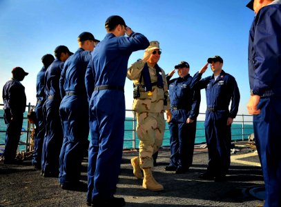US Navy 090326-N-4774B-048 Rear Adm. Thomas A. Cropper, deputy commander of U.S. Naval Forces Central Command, boards the guided-missile cruiser USS Lake Champlain (CG 57) as it guards the waters surrounding the Al Basra Oil Te