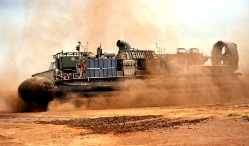 US Navy 090401-N-0506A-518 A landing craft air cushion from Assault Craft Unit (ACU) 5 comes ashore during an exercise near Camp Lemonier, Djibouti photo