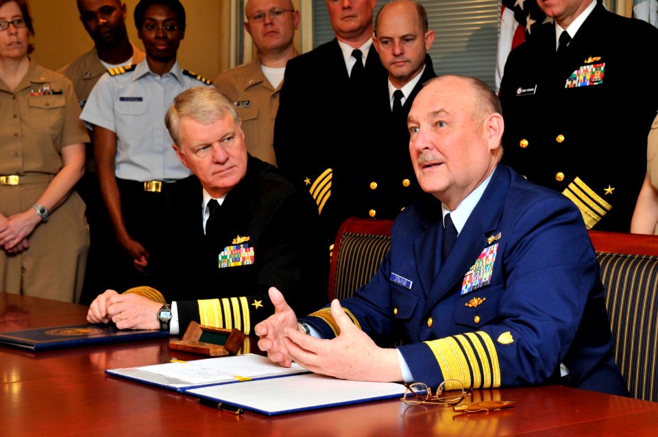 US Navy 090401-N-8273J-022 Commandant of the Coast Guard Adm. Thad W. Allen, right, delivers remarks as Chief of Naval Operations (CNO) Adm. Gary Roughead looks on after the signing of the memorandum of agreement for the Safe H