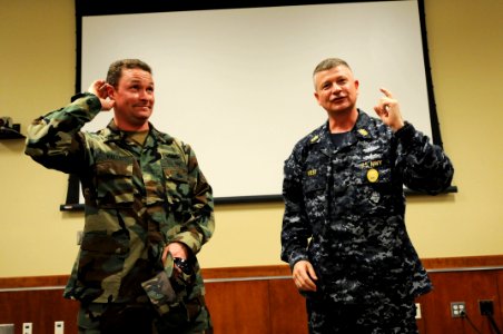 US Navy 090331-N-9818V-216 Master Chief Petty Officer of the Navy (MCPON) Rick West ends his all-hands call at Stennis Space Center with a