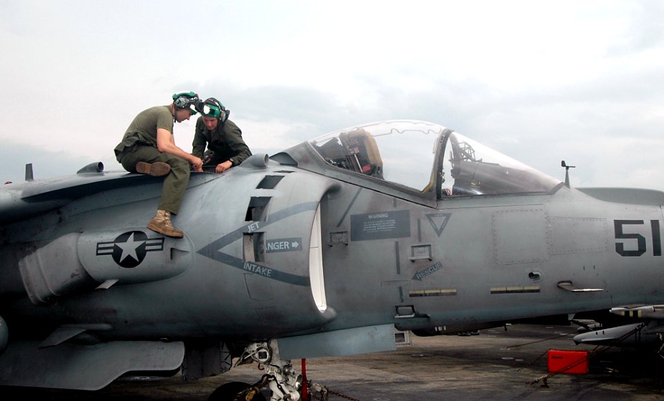 US Navy 090401-N-6410J-010 Sgt. Adam Palmer and Cpl. Chris Gibson, assigned to the 13th Marine Expeditionary Unit (13th MEU) Air Combat Element embarked aboard the amphibious assault ship USS Boxer (LHD 4)