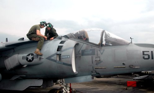 US Navy 090401-N-6410J-010 Sgt. Adam Palmer and Cpl. Chris Gibson, assigned to the 13th Marine Expeditionary Unit (13th MEU) Air Combat Element embarked aboard the amphibious assault ship USS Boxer (LHD 4)