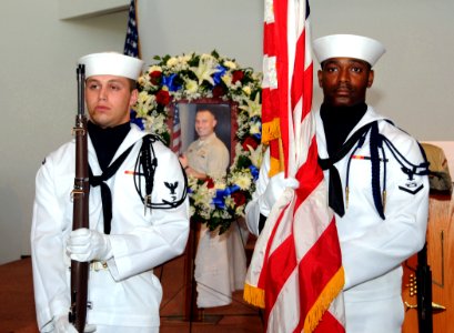 US Navy 090403-N-3666S-013 Sailors assigned to the color guard of Naval Facilities Engineering Command, Hawaii parade the colors during a remembrance ceremony for Lt. j.g. Francis Toner IV