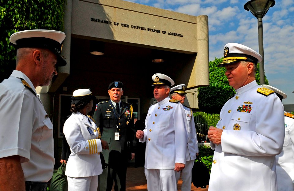 US Navy 090406-N-8273J-023 Chief of Naval Operations (CNO) Adm. Gary Roughead, right, speaks with South African Navy Capt. Leon Van Dyk, left, and members of the U.S Embassy