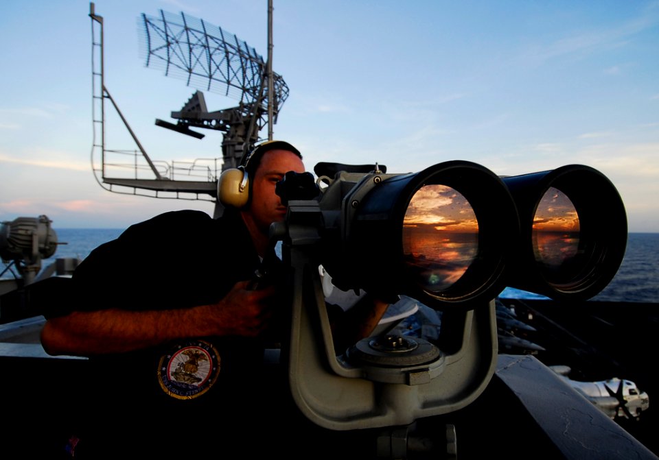 US Navy 090408-N-6538W-189 Boatswain's Mate Seaman Apprentice Paul Coombs, from Dover, Ohio, uses the