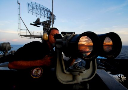 US Navy 090408-N-6538W-189 Boatswain's Mate Seaman Apprentice Paul Coombs, from Dover, Ohio, uses the