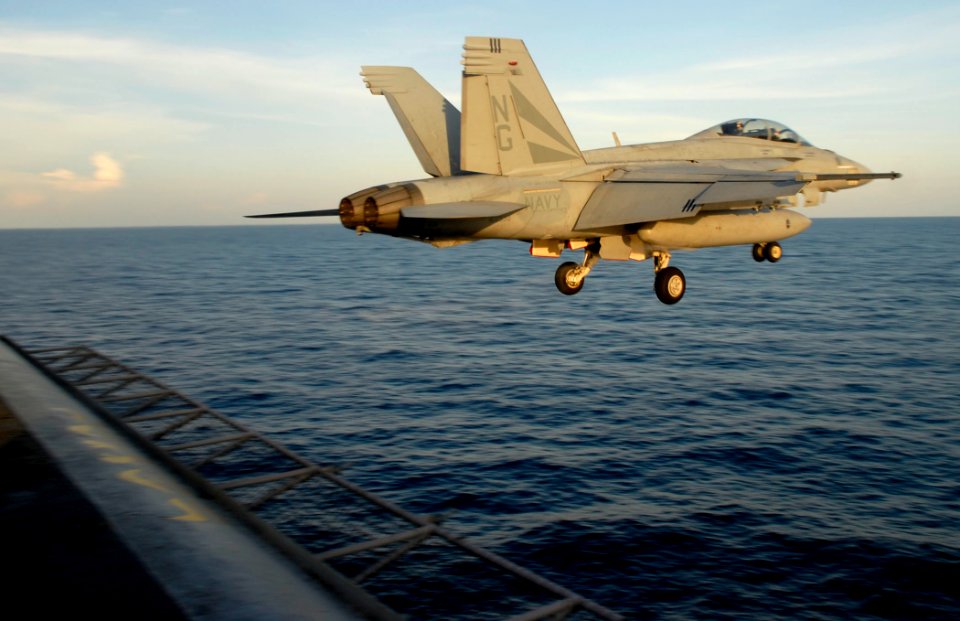 US Navy 090408-N-2610F-194 An F-A-18F Super Hornet from the Black Knights of Strike Fighter Squadron (VFA) 154 launches from the aircraft carrier USS John C. Stennis (CVN 74)